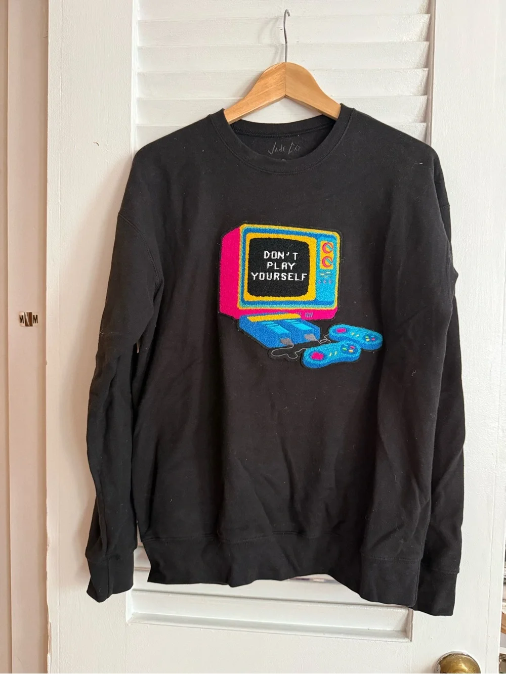 Black Graphic Crewneck Sweater with Retro Console Motif